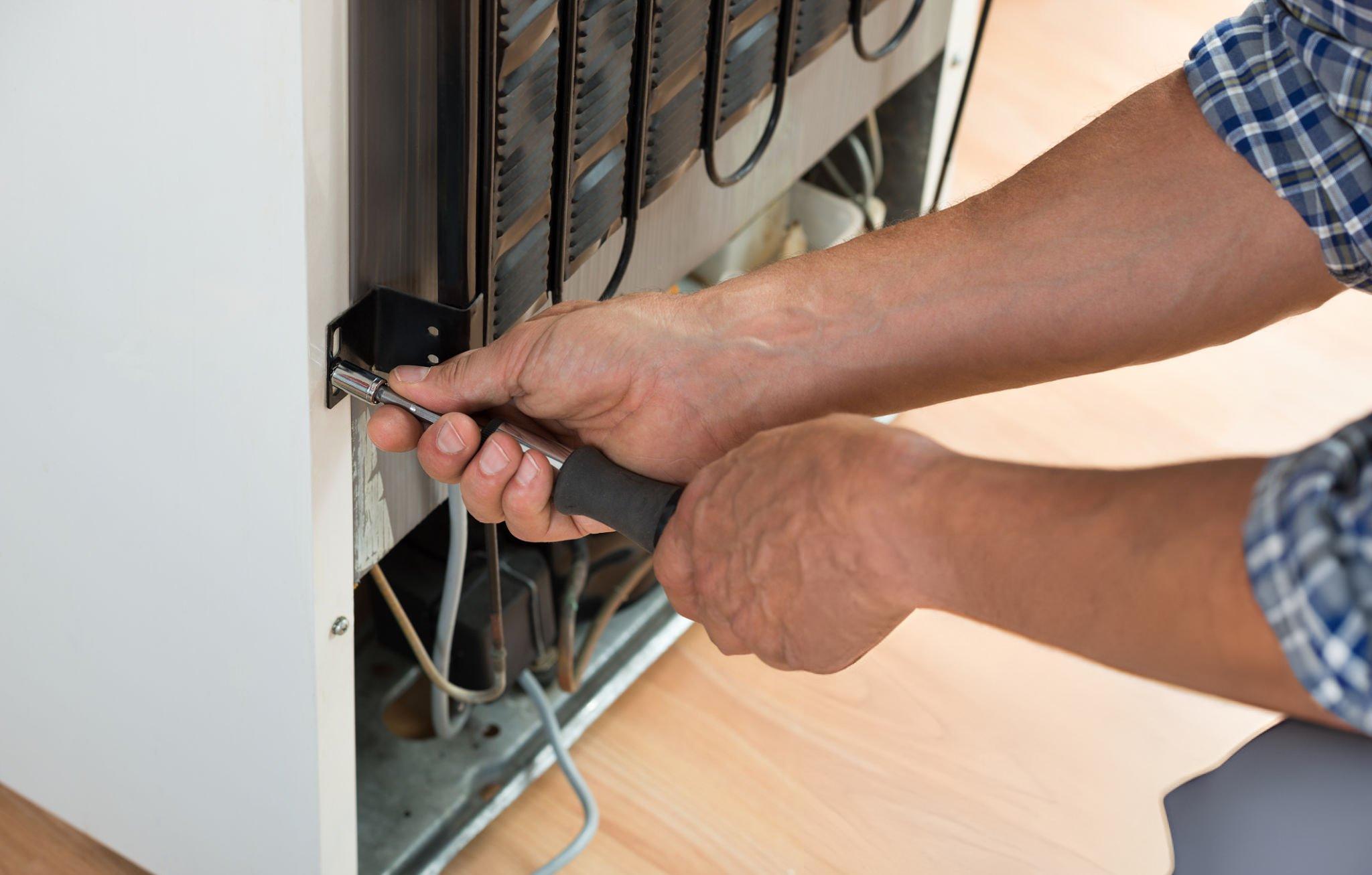 Fridge-repairing karachi